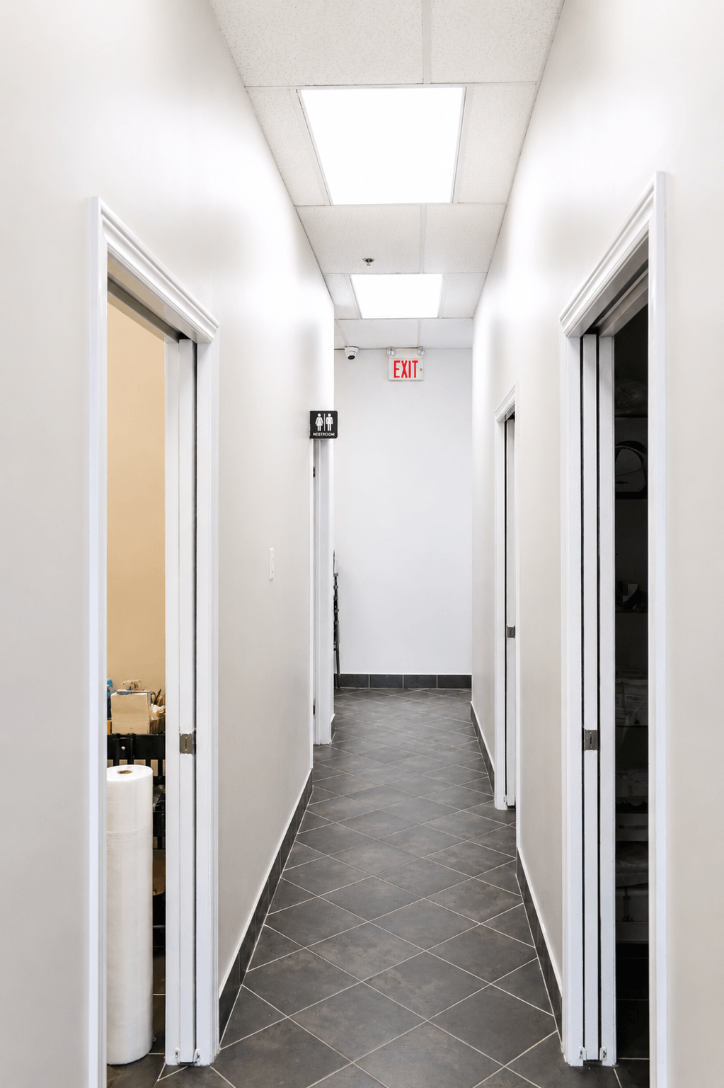 Bright salon hallway and treatment suites
